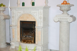 камин из белого мрамора